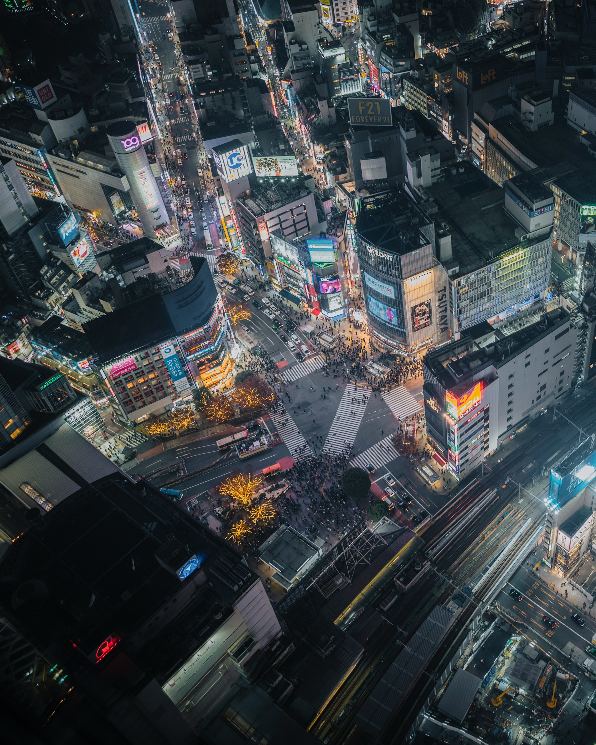 An aerial view of Tokyo's Shibuya crossing at night in Japan